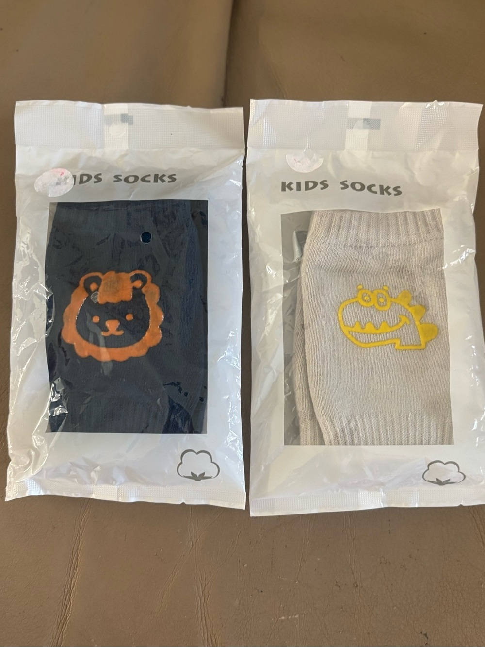 Lartppy NIP 2 pairs of baby sock covers/elbow pads/crawling knee pads. RT 22.99